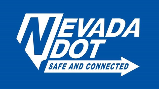 A blue background with white lettering "NEVADA DOT" and arrow pointing right underneath.