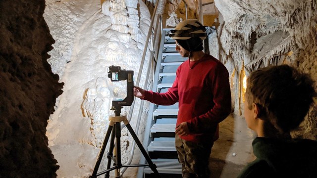 cavers creating the virtual cave tour with LiDar