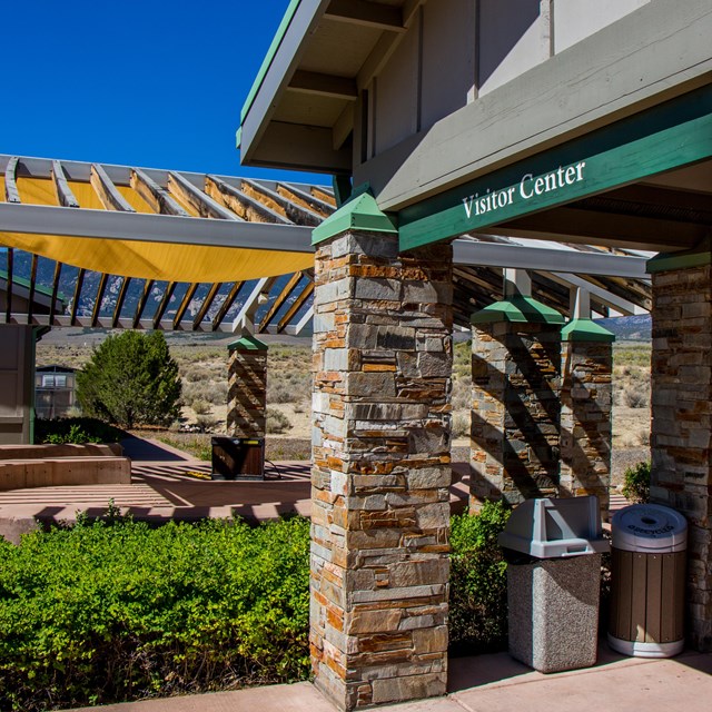 Brown and green visitor center entrance