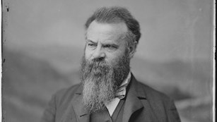 A black and white photo of John Wesley Powell