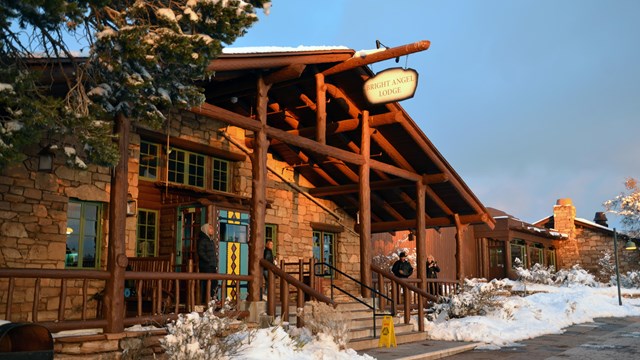 The front of Bright Angel Lodge in the snow.