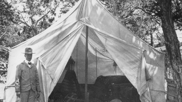 John Verkamp in front of his tent.