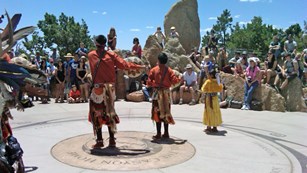 Tribal members hold a ceremony near the Grand Canyon Visitor Center