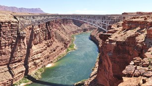 The Navajo Bridge spans across the Colorado River. 
