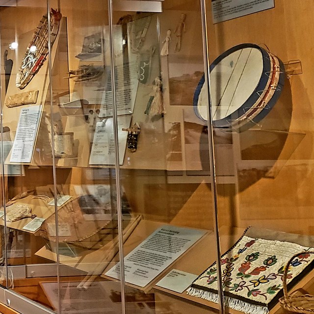 Display cases containing cultural aritifacts.