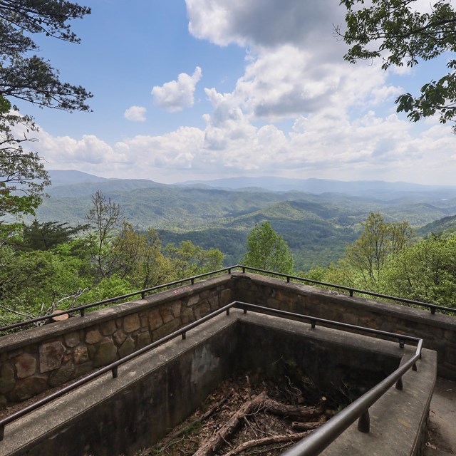 A scenic overlook viewpoint of mountains.