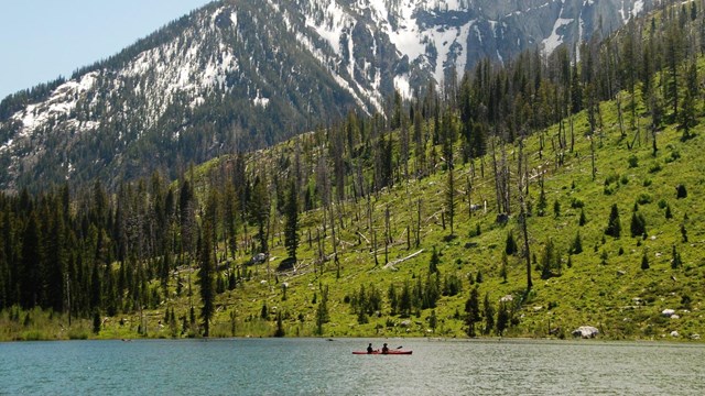 A kayak on String Lake below the Tetons