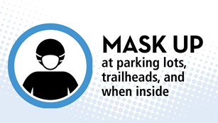 Text and icon: Mask up at parking lots, trailheads, and when inside