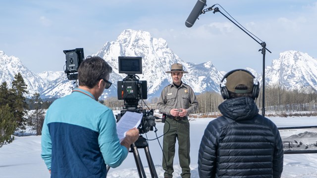 Bear biologist giving on-camera interview