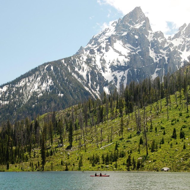 A kayak on String Lake below the Tetons