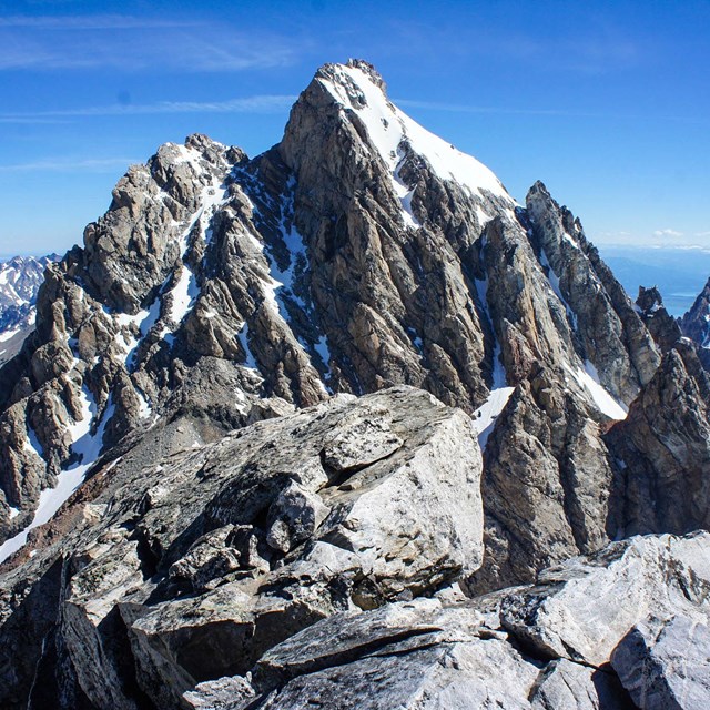 A photo of the Grand Teton taken from a neighboring summit