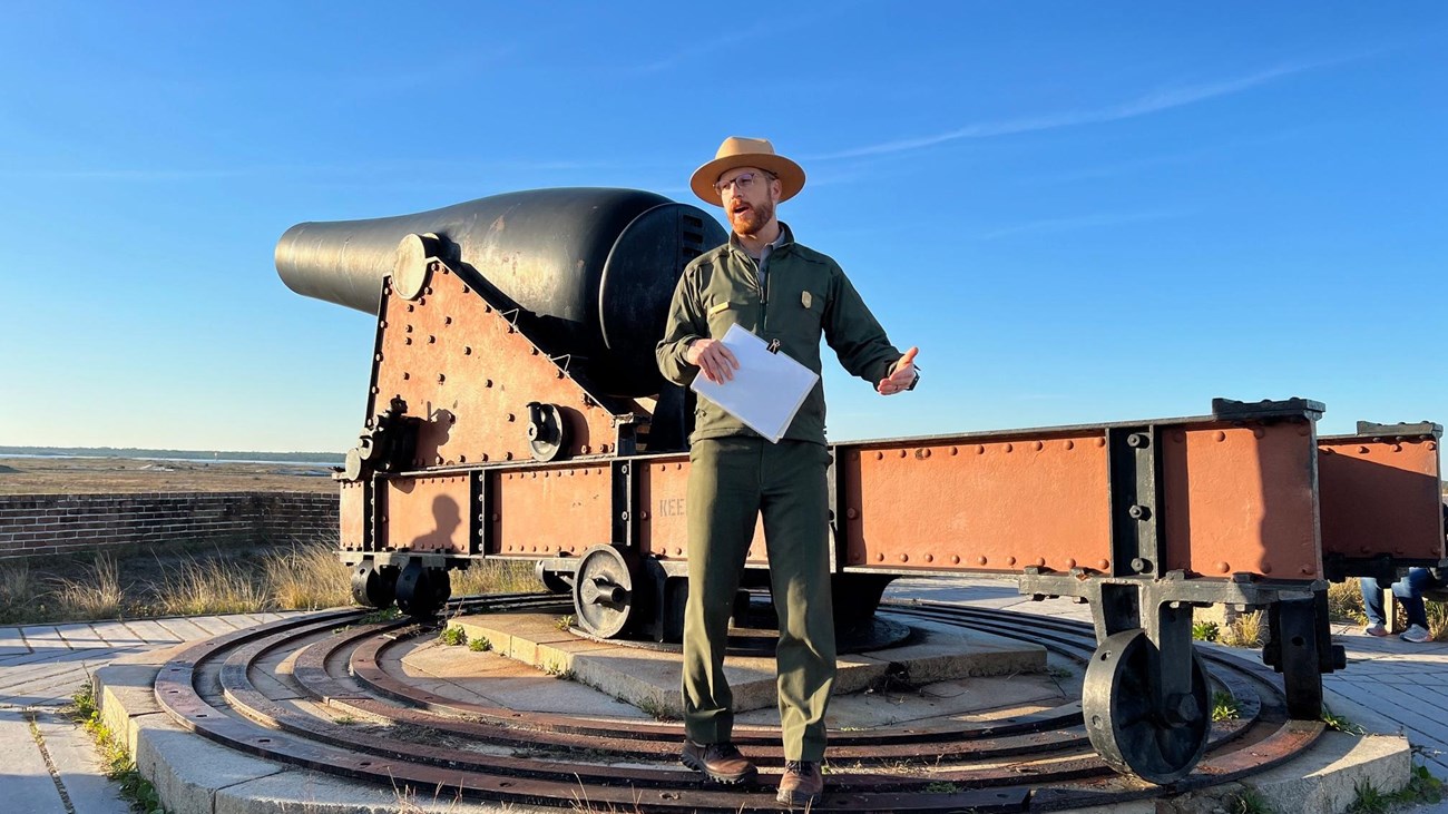 A ranger talks to visitors about park resources