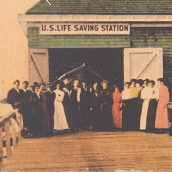 A colorized photo showing a group of people standing in front of a boat house.