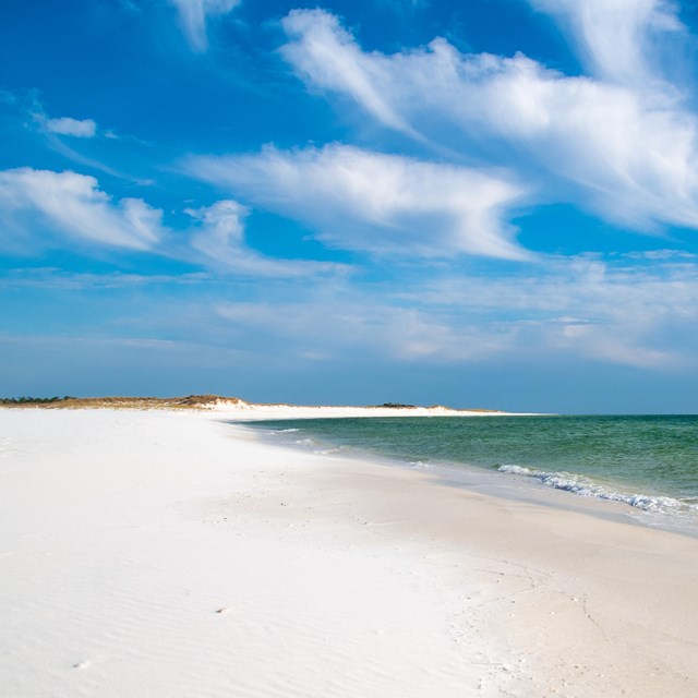 A beach with white sand