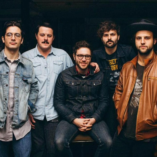 photograph of the band members of Ona