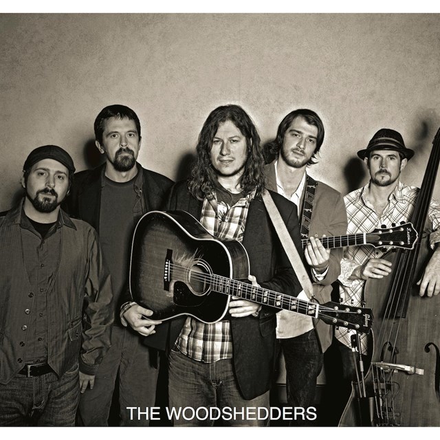 sepia photographer of the band members of The Woodshedders