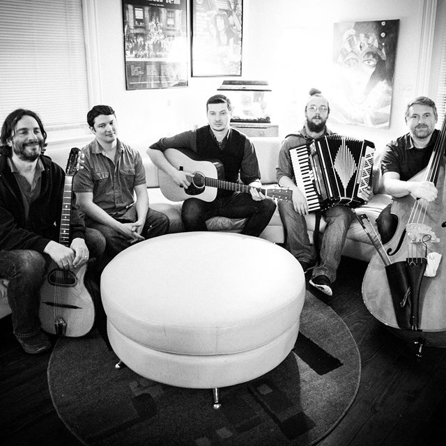 black and white photograph of the band members of A Faster Buffalo