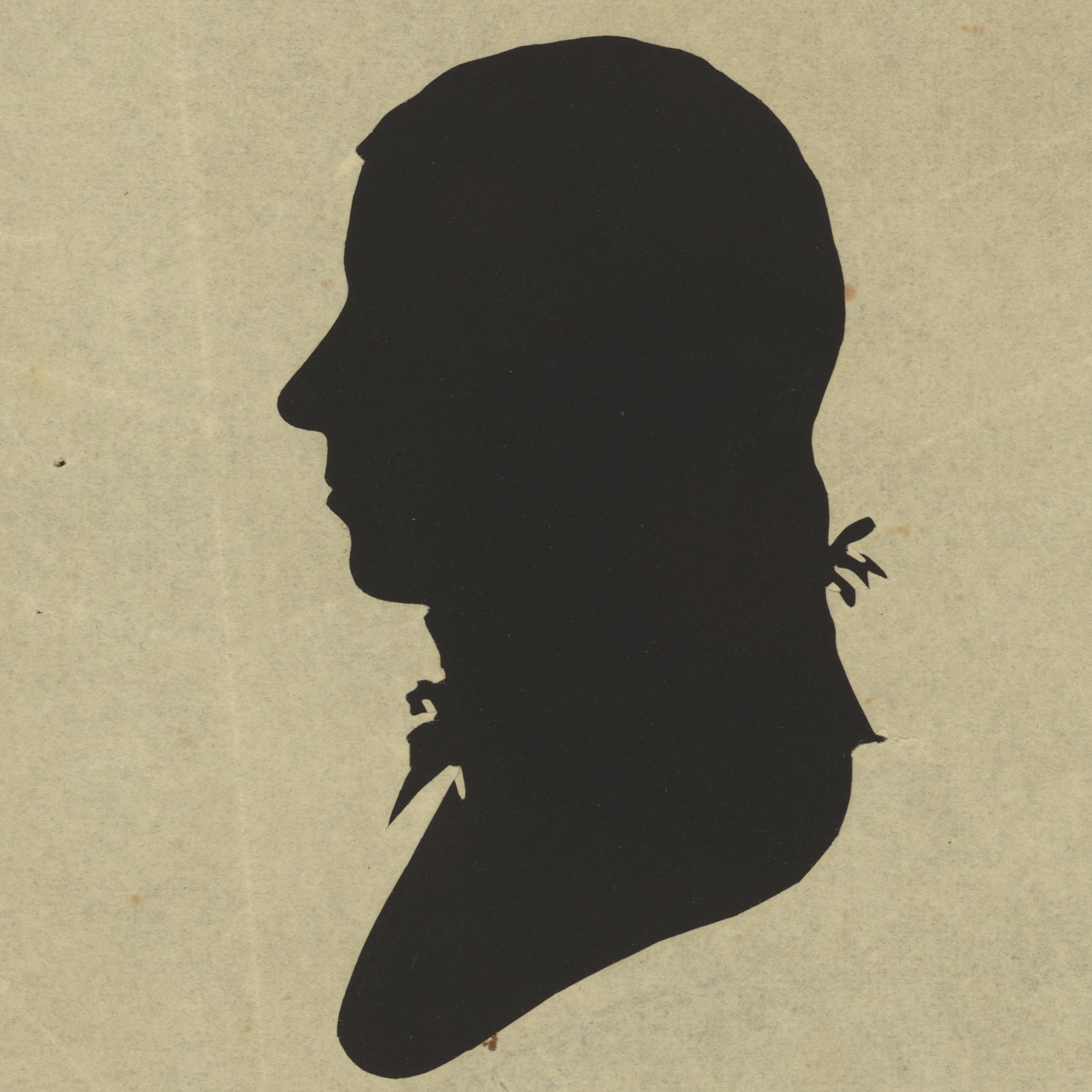 silhouette of a man facing left
