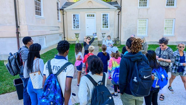 A teacher leads a group of students at Hampton NHS