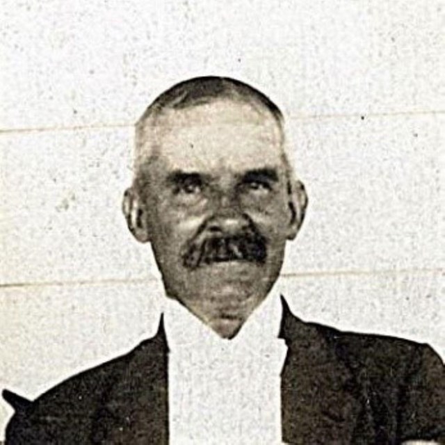 A black and white photo of John Ridgely.