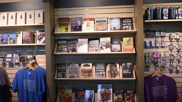 Books, T-Shirts, and Coffee Mugs sold in  the Bookstore