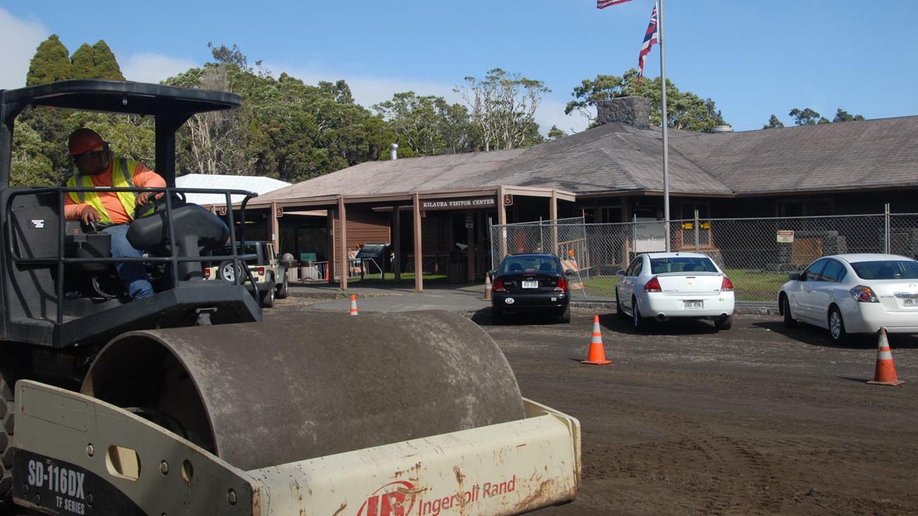 Roller machinery in front of a visitor center. 