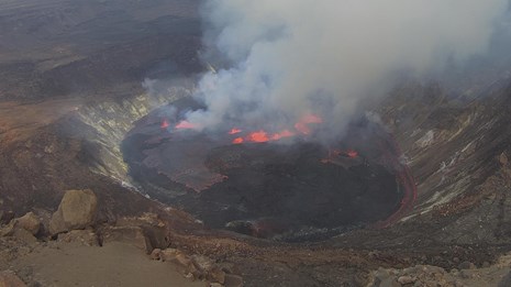 A lava lake in a volcanic crater