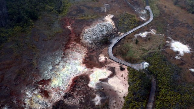 Fumes rising from sulphur-covered rocks