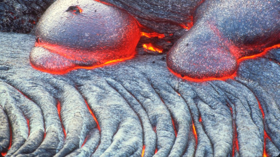 Flows of molten pahoehoe lava overlapping
