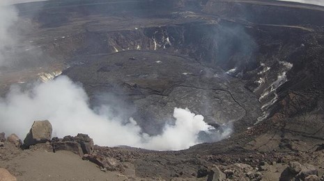 A lava lake in a volcanic crater
