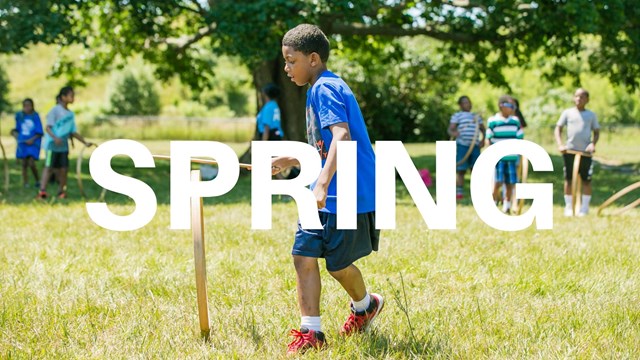 word Spring over boy playing