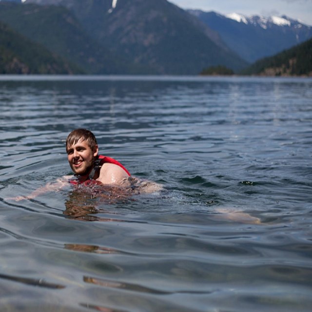Man swimming in lake