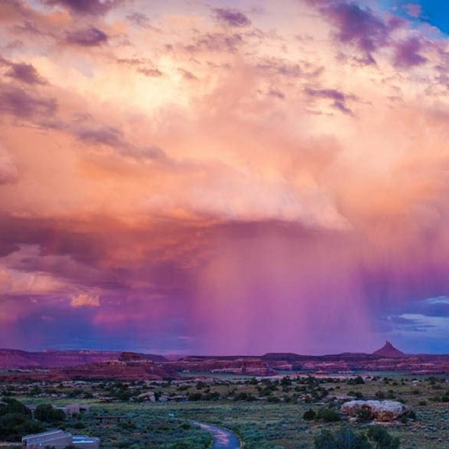 Monsoon storm clouds dropping rain over the western landscape