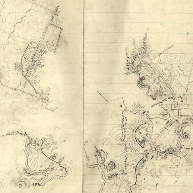 A hand drawn map on lined paper depicts a battlefield.