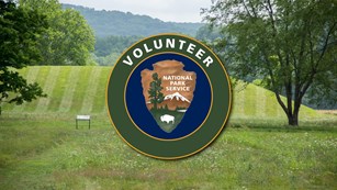 Seip mound in background behind NPS VIP logo