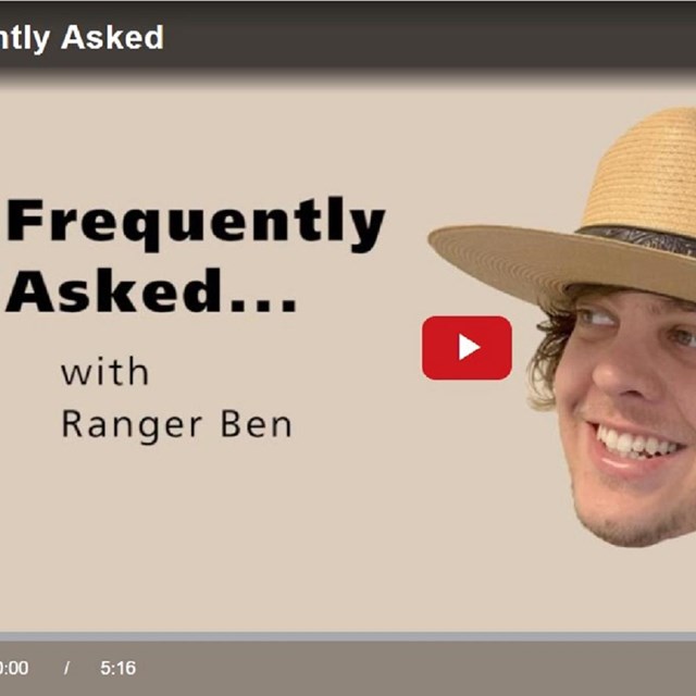 a ranger with a hat smiles at text that reads Frequently Asked.