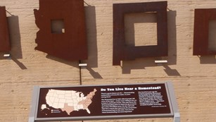 Interpretive signs about amount of land homesteaded