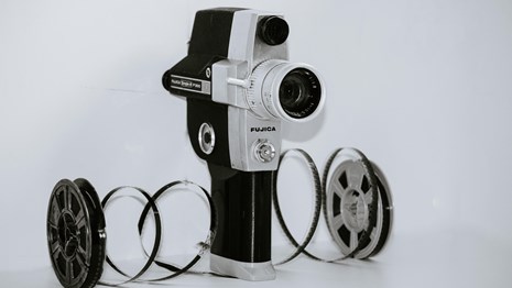 Image of vintage camera and two reels of film