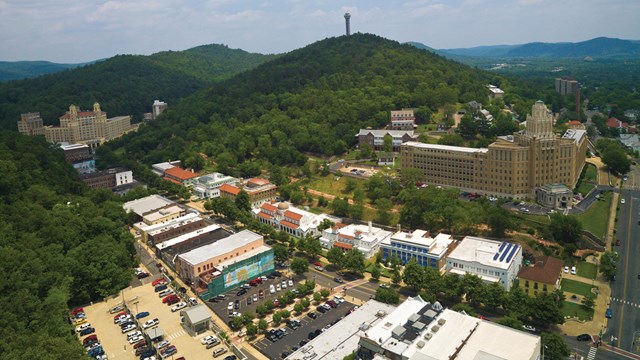 Aerial view looking East towards downtown and bathhouse row. All eight bathhouses can be seen.