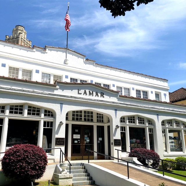 White stuccoed building built in the early 1900s. 