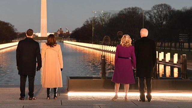 Joe and Jill Biden, Kamala Harris, and Doug Emhoff looking towards the Reflecting Pool