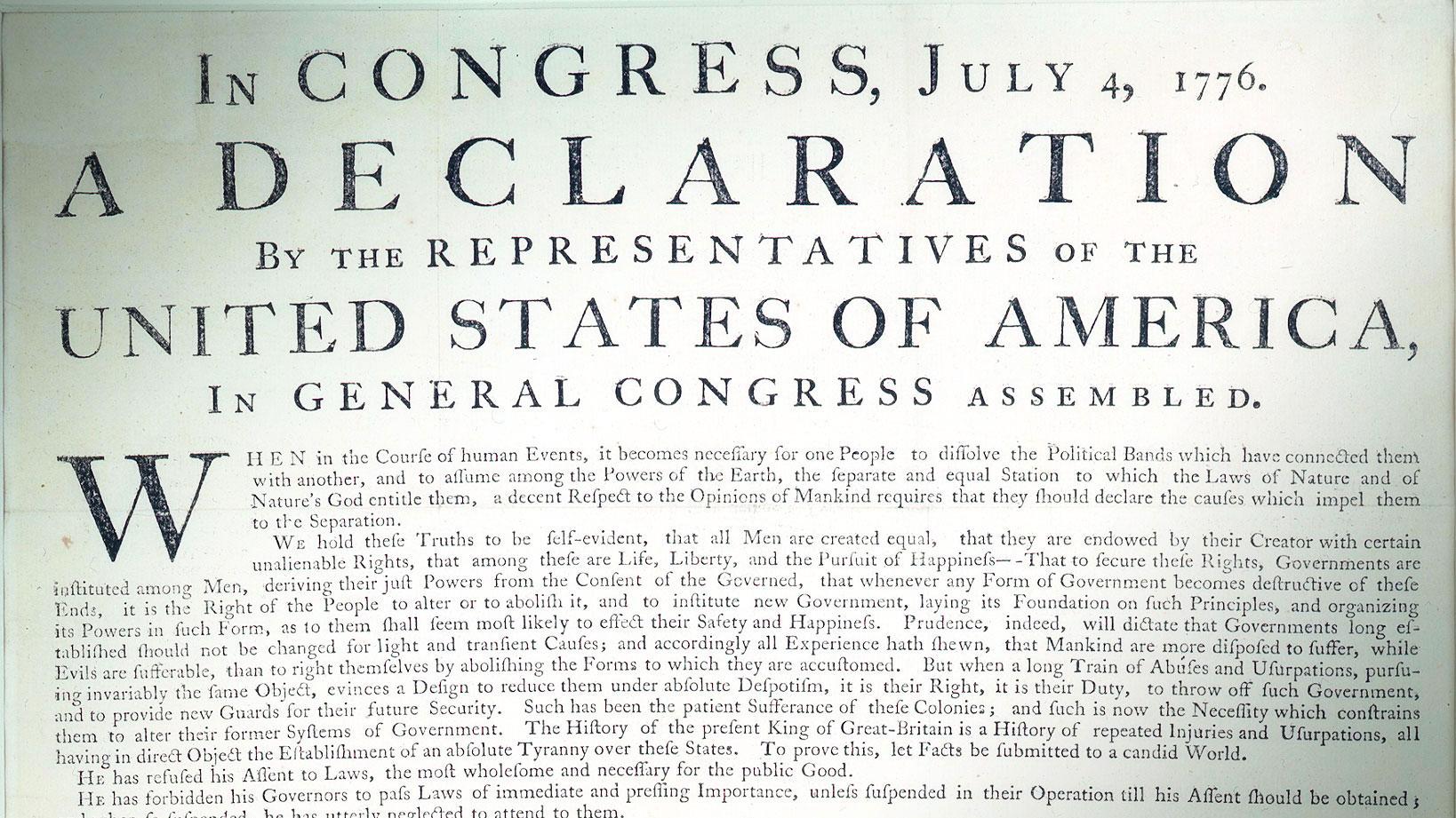 Color photo showing a detail of the Declaration of Independence printed document.