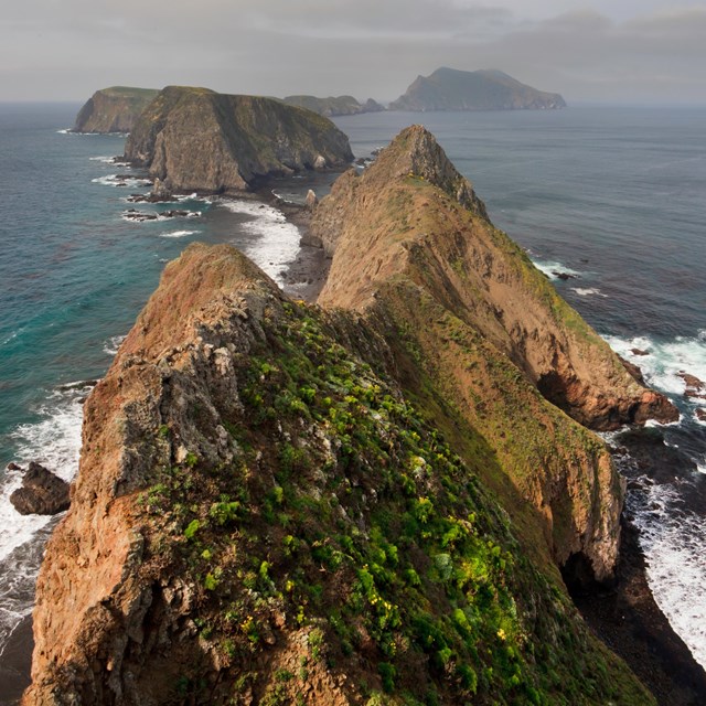 Three islets in ocean. ©Tim Hauf, timhaufphotography.com