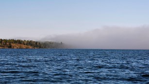 fog rolling onto the island off of Lake Superior