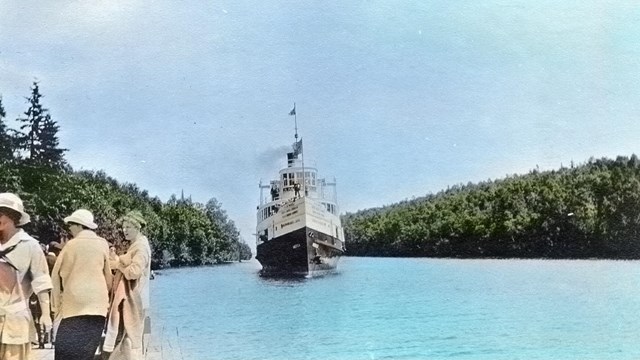SS America approaching dock in Tobin Harbor