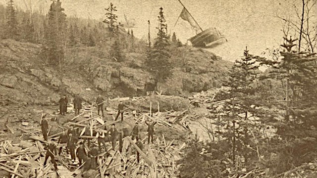wreckage of the Algoma on Mott Island, with passengers looking on