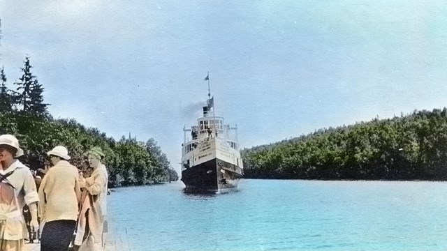 SS America approaching dock in Tobin Harbor