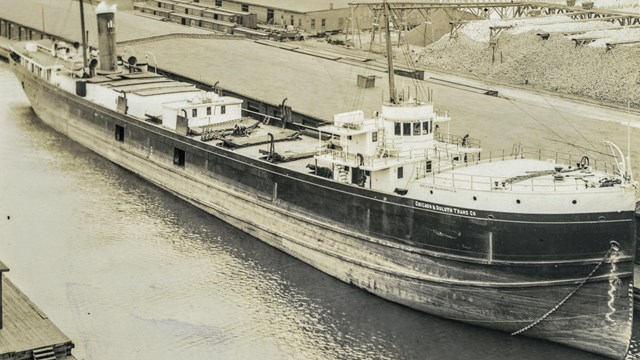 SS William H. Gratwick docked, smoke billowing