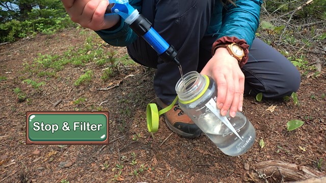 Close up of a half-full water bottle.