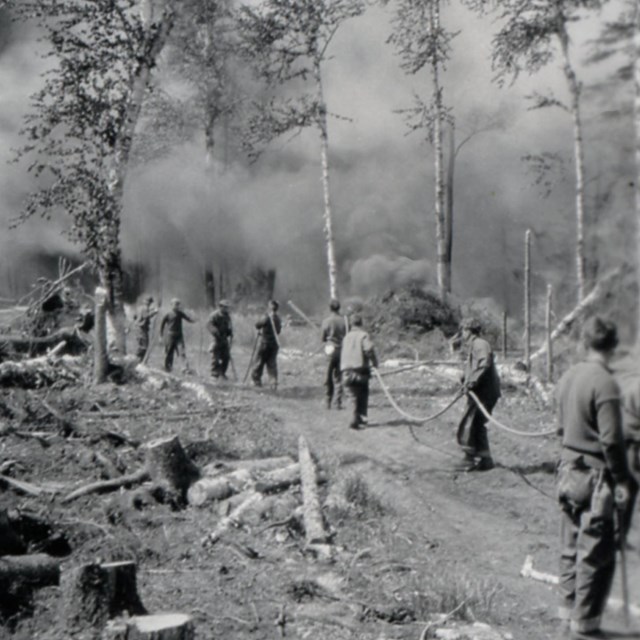 CCC crew working the smoky frontline of 1936 fire